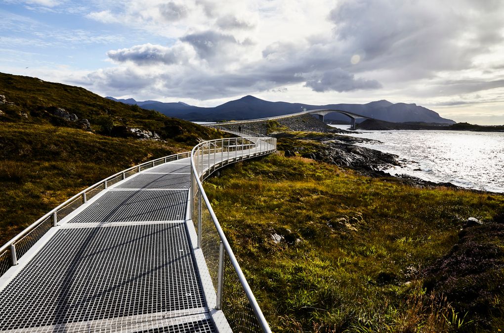 The Storseisundet Bridge, part of Norway’s scenic Atlanterhavsvegen (Atlantic Road), can be seen from the adjacent Eldhusøya art installation, a meandering set of walkways. (DAVID B. TORCH/NYT)
