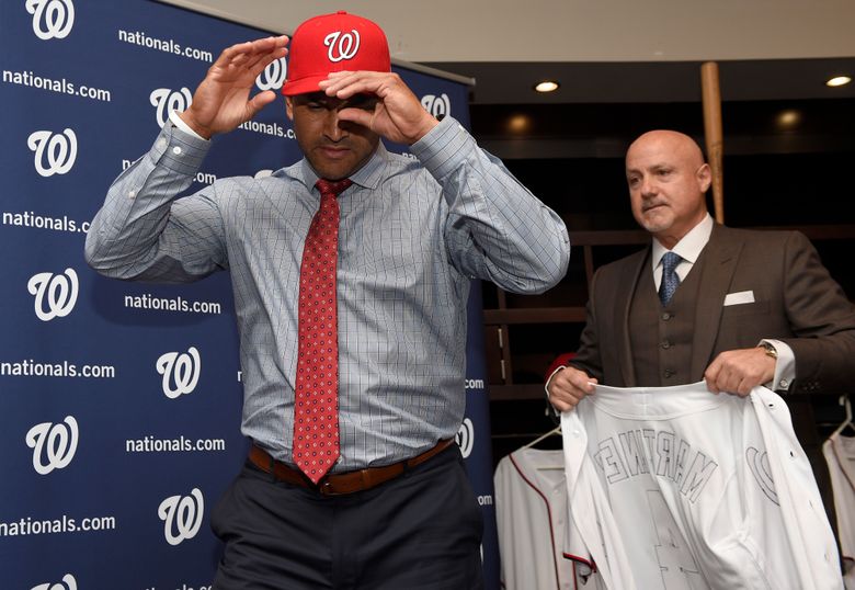 Washington Nationals' manager Davey Martinez took some time to