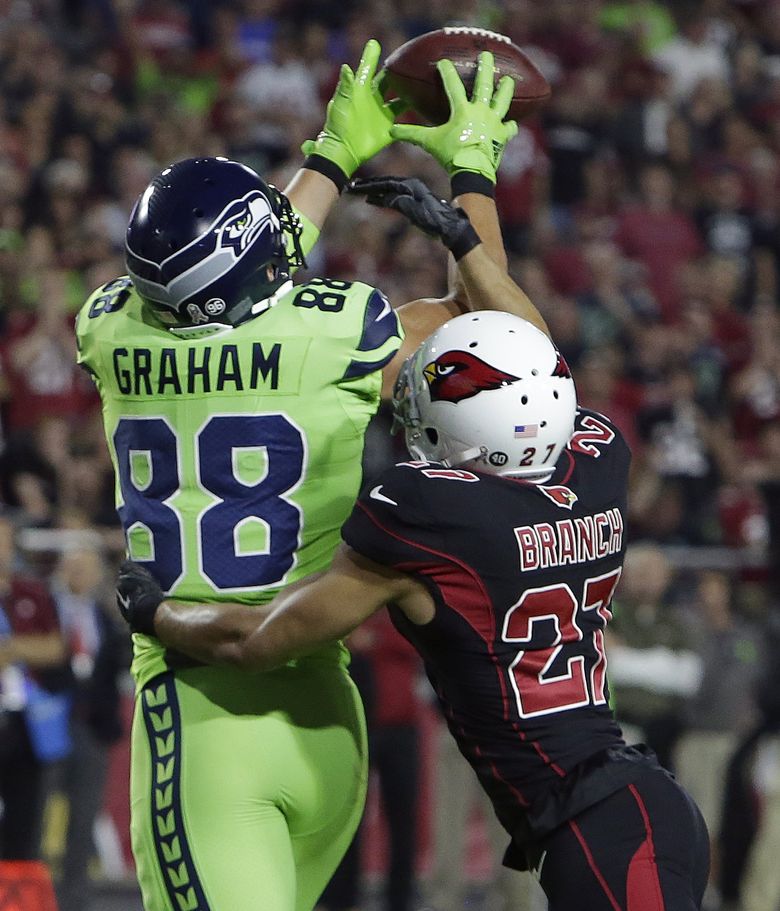 Seattle Seahawks tight end Jimmy Graham (88) brushes off a tackle by  Carolina Panthers outside linebacker A.J. Klein (56) at CenturyLink Field  in Seattle, Washington on December 4, 2016. Graham caught six