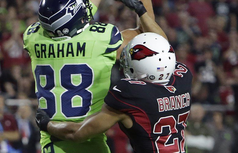 Seattle Seahawks tight end Jimmy Graham (88) brushes off a tackle by  Carolina Panthers outside linebacker A.J. Klein (56) at CenturyLink Field  in Seattle, Washington on December 4, 2016. Graham caught six