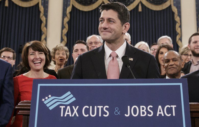 Speaker of the House Paul Ryan, R-Wis., smiles as he is joined by, from left, Rep. Vern Buchanan, R-Fla., Rep. Cathy McMorris Rodgers, R-Wash., and House Majority Whip Steve Scalise, R-La., right, as they unveil the GOP’s far-reaching tax overhaul, the first major revamp of the tax system in three decades, on Capitol Hill in Washington, Thursday, Nov. 2, 2017. (AP Photo/J. Scott Applewhite) DCSA106 DCSA106