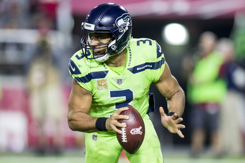 Analysis: Russell Wilson once again keeps Seahawks from earning failing  grade on offense