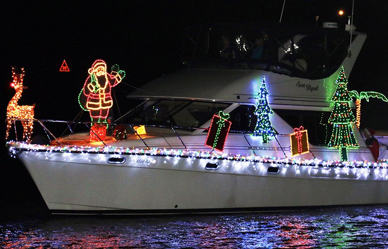 La Conner’s Lighted Boat Parade sets waters shimmering on Swinomish Channel.