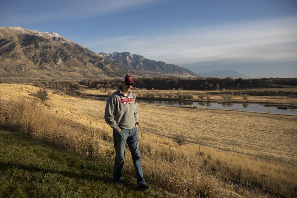 Jeff Anderson, Luke Falk’s uncle, walks along his mother’s property in Deweyville, Utah. The small town is where their ancestors settled in the 1800s, and where his nephew Luke Falk spent a lot of time as a kid, taking in this view of the Wellsville Mountains from his grandmother’s house. (Bettina Hansen/The Seattle Times)