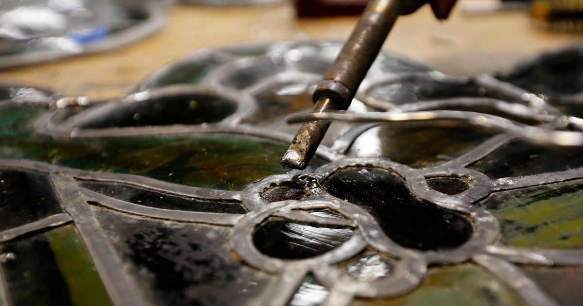 Iowa community restores old church’s stainedglass windows The