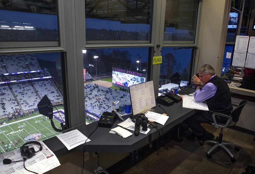 Bob Rondeau does game prep in his radio booth at Husky Stadium before the start of the Apple Cup where he will be announcing his last game at Husky Stadium Saturday, November 25, 2017. (Ellen M. Banner / The Seattle Times)