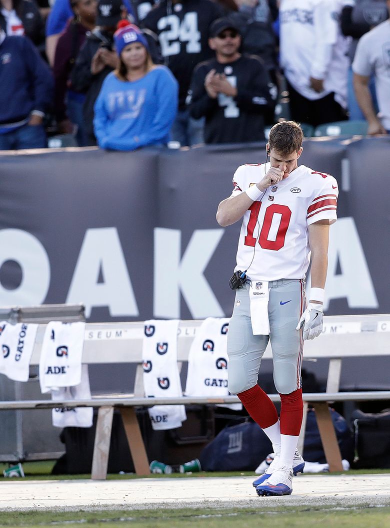 Eli Manning spends day as spectator in Giants 24-17 loss