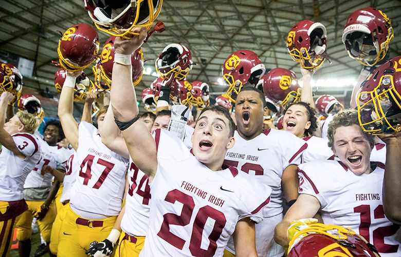 O’Dea celebrates after winning the Class 3A state title game against Rainier Beach at the Tacoma Dome on Friday night (Courtney Pedroza/The Seattle Times)
