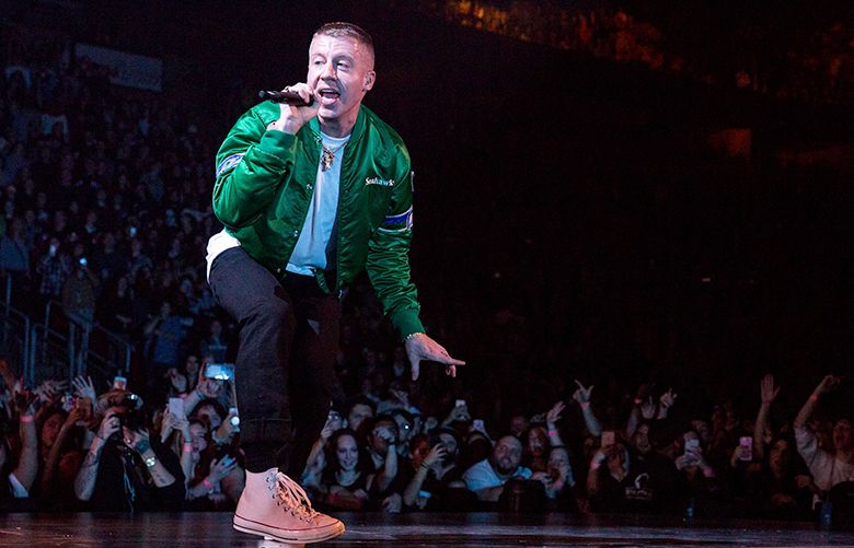 Macklemore performs during the Gemini Tour at KeyArena in Seattle on Friday, Dec. 22, 2017. The Saturday show is also sold out at KeyArena in Seattle, before he continues his tour in Brisbane, Australia on Feb. 2, 2018.