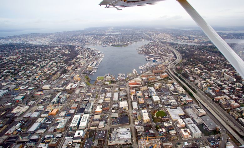 This photo was taken in January 2008 from a Kenmore Air float plane above the South Lake Union neighborhood. The area has changed dramatically since, with many of the buildings pictured here replaced or about to be, most giving way to make more space for Amazon. (Mike Siegel / The Seattle Times)