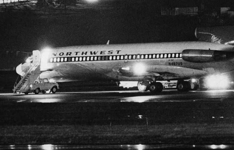 Ran Nov. 25, 1971. With D.B. Cooper, 6 crew members and 36 passengers still aboard, the hijacked Northwest Orient Airlines Boeing 727  plane is refueled. Cash and parachutes were handed over at Sea-Tac airport.