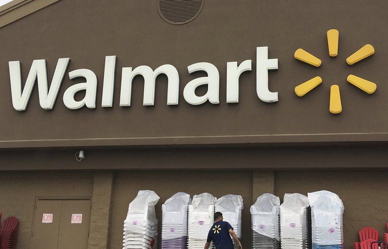 Walmart raises starting wages, handing out $1,000 bonuses - The