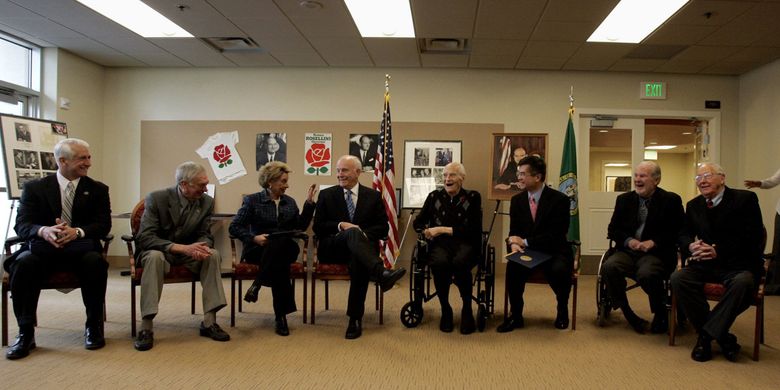 Gathered to celebrate the 100th birthday of former Gov. Al Rosellini in 2010, from left: U.S. Rep. Dave Reichert, Mike Lowry, Gov. Chris Gregoire, Dan Evans, Rosellini, Gary Locke, Booth Gardner and John Spellman. (Alan Berner / The Seattle Times, 2010)