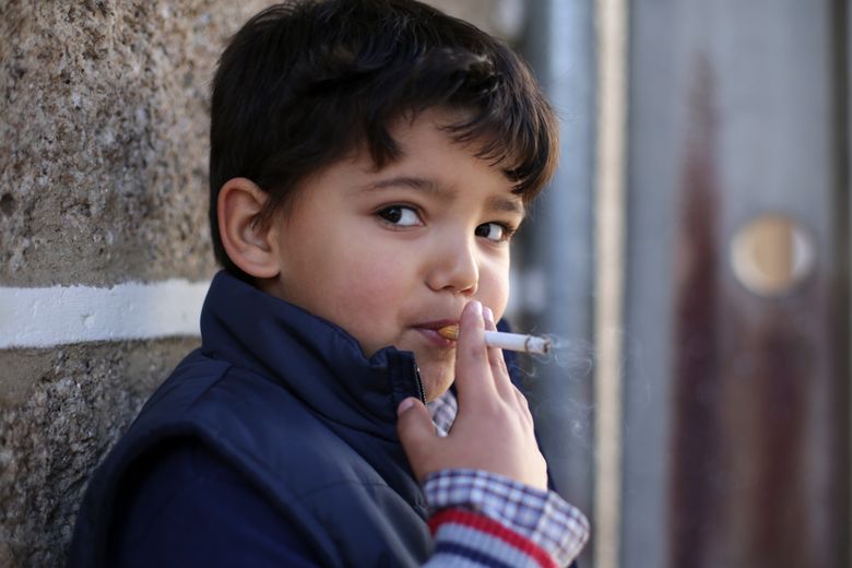 12 year old smoking cigarettes Portuguese town encourages children to smoke at Epiphany