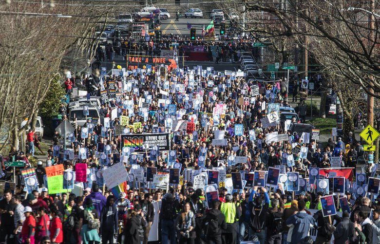 On Martin Luther King Jr. Day, thousands gather and march through ...