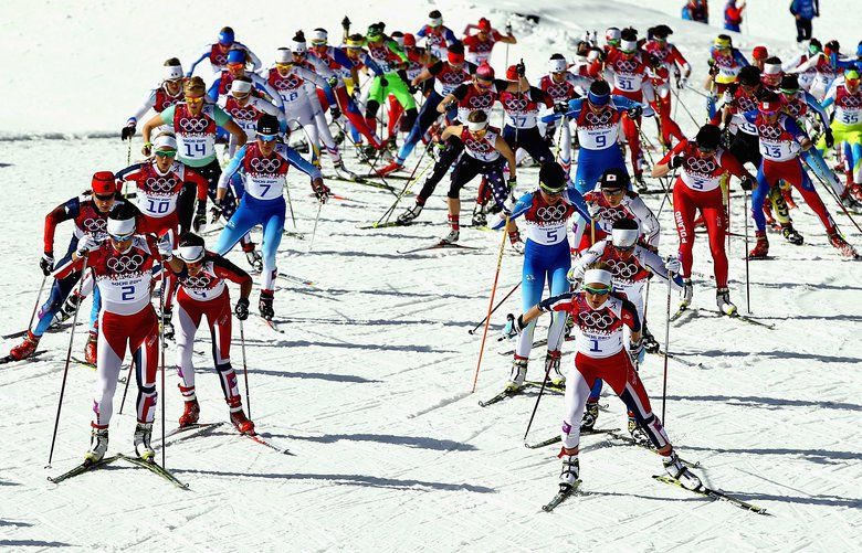 Athletes compete during the Women’s 30 km Mass Start Free during day 15 of the Sochi 2014 Winter Olympics.  (Al Bello/Getty Images)