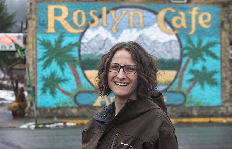 Tuesday, November 21, 2017.   Leah Valleroy was recently elected to the Roslyn City Council as a write-in candidate. Story is about the growing number of women locally, statewide and nationally to win elected office. She’s doing a photo-op by the famous Roslyn Cafe sign.