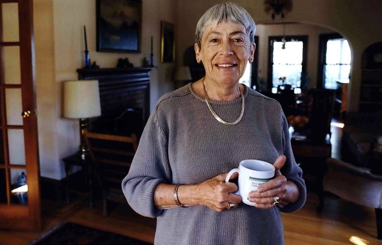 FILE – In this Sept. 9, 2001 file photo, author Ursula Le Guin appears at her home in Portland, Ore. Le Guin, who died earlier this week at age 88, is a nominee for a PEN America literary award for her book of essays. Winners will be announced Feb. 20. (Benjamin Brink/The Oregonian via AP)