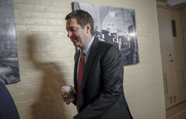 House Intelligence Committee Chairman Devin Nunes, R-Calif., a close ally of President Donald Trump who has become a fierce critic of the FBI and the Justice Department, strides to a GOP conference at the Capitol in… (AP Photo/J. Scott Applewhite)