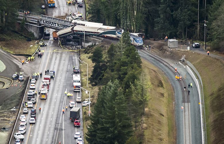 An Amtrak train derailed and fell off of a bridge and onto Interstate 5 near Mounts Road between Lakewood and Olympia Washington Monday December 19, 2017.