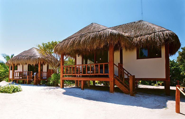 In a undated handout photo, bungalows at Mukan Resort in Mexico. To get to the resort, guests take a 45-minute boat ride from Tulum, Mexcio. (Mukan Resort via The New York Times) — NO SALES; FOR EDITORIAL USE ONLY WITH  52 PLACES LODGING ADV14 BY ELAINE GLUSAC FOR JAN. 14, 2018. ALL OTHER USE PROHIBITED. —