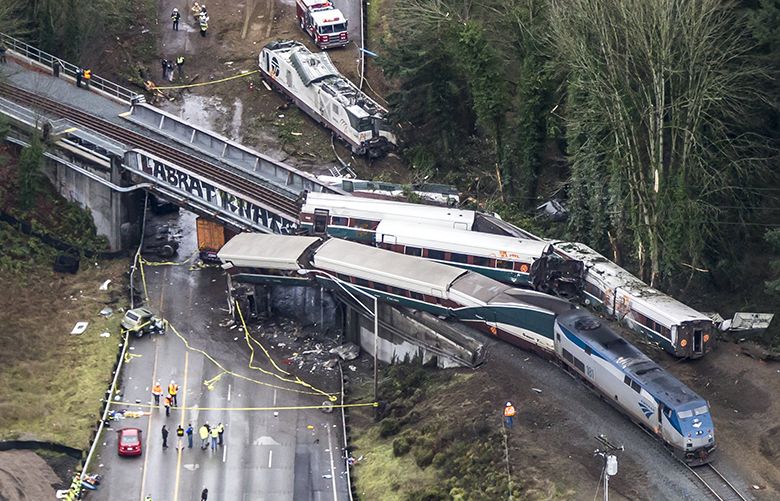 An Amtrak train derailed and fell off of a bridge and onto Interstate 5 near Mounts Road between Lakewood and Olympia Washington Monday December 19, 2017.