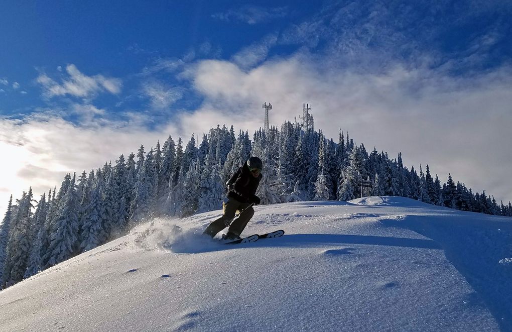 A skier turns in powder below Wardner Peak at Silver Mountain Ski Resort, Idaho. (Willy Bartlett)