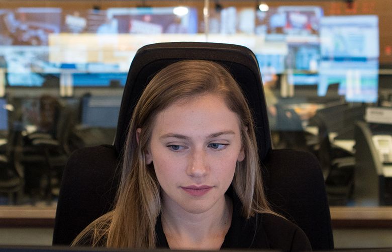 Taylor Winkler at work at the New York City Emergency Management Department in Brooklyn. When official alerts from the city arrive via Twitter, text, email or mobile app, Winkler is often the one sending them. (Emon Hassan / The New York Times)