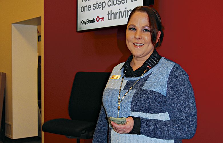 Trisha Stepp has worked for KeyBank since she completed the free BankWork$ training program in 2013. (Michelle Archer / The Seattle Times Jobs staff)