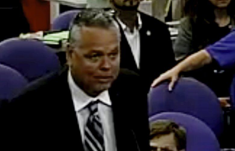 This Feb. 18, 2015 image taken from video provided by Broward County Public Schools shows school resource officer Scot Peterson during a school board meeting of Broward County, Fla. During the shootings at Marjory Stoneman Douglas High School on Feb. 14, 2018, Peterson took up a position viewing the western entrance of the building for more than four minutes after the shooting started, but “he never went in,” Broward County Sheriff Scott Israel said at a news conference.  Peterson, was suspended without pay and placed under investigation, then chose to resign, Israel said  (Broward County Public Schools via AP) NYDK713 NYDK713