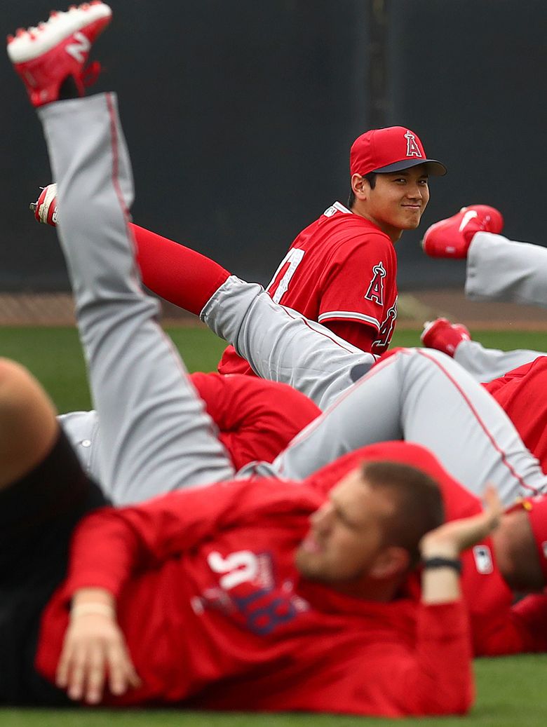 Los Angeles Angels' Shohei Ohtani stretches during a spring