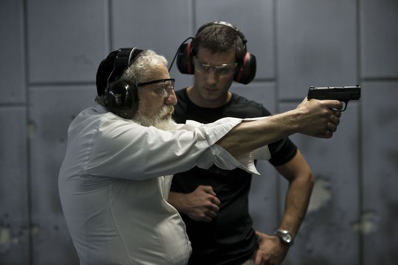 An Ultra Orthodox Jewish man practices at a shooting range in Jerusalem, Israel, in 2015.  (ABIR SULTAN/EPA)