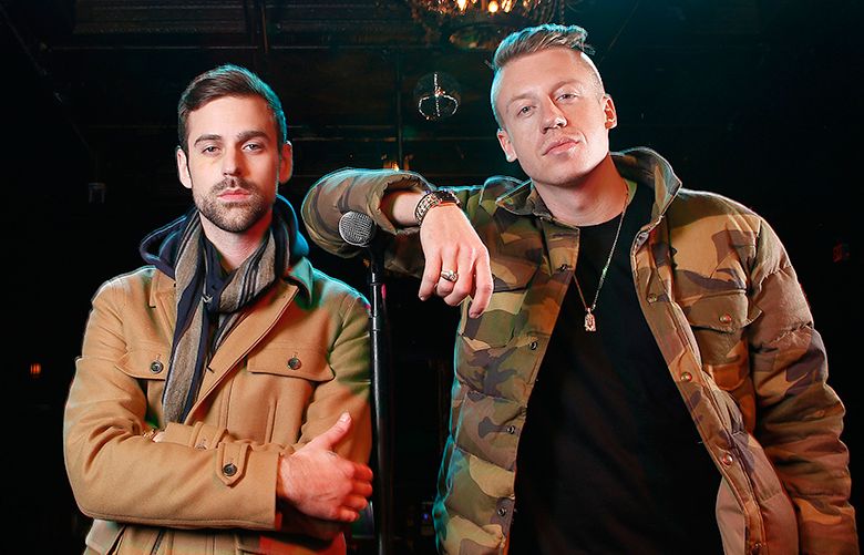 FILE – In this Nov. 20, 2012 file photo, American musician Ben Haggerty, better known by his stage name Macklemore, right, and his producer Ryan Lewis pose for a portrait at Irving Plaza in New York.  Macklemore & Ryan Lewis are top contenders at the Grammy Awards on Sunday, Jan. 26, 2014, with seven nominations, including best new artist and song of the year for “Same Love.” Their debut album, “The Heist,” is up for album of the year and best rap album, while the massive hit “Thrift Shop” is nominated for best rap song and rap performance. The duo’s other hit, “Can’t Hold Us,” will compete for best music video. (Photo by Carlo Allegri/Invision/AP, File)