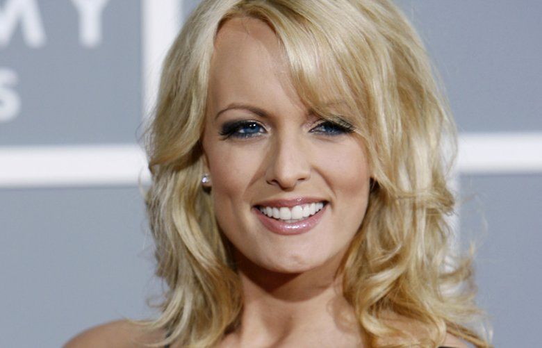 FILE – In this Feb. 11, 2007 file photo, Stormy Daniels arrives for the 49th Annual Grammy Awards in Los Angeles. A nonprofit watchdog group has asked the Justice Department and Office of Government Ethics to investigate whether a secret payment to Daniels made prior to the 2016 presidential election violated federal law because Donald Trump did not list it on his financial disclosure forms.  (AP Photo/Matt Sayles) WX102 WX102