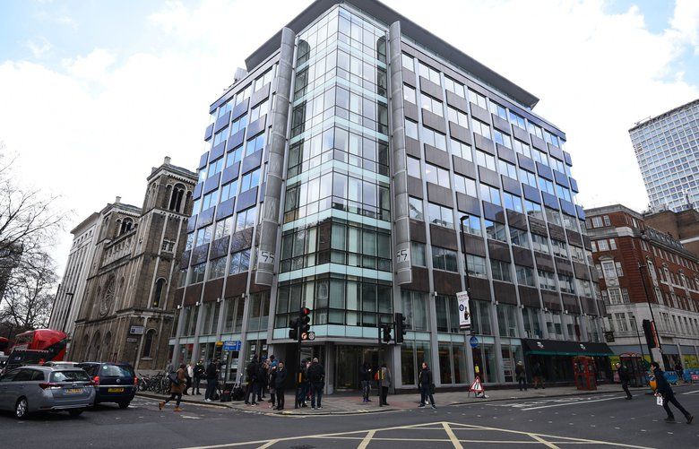 The offices of Cambridge Analytica (CA) in central London, after it was announced that Britain’s information commissioner Elizabeth Denham is pursuing a warrant to search Cambridge Analytica’s computer servers, Tuesday March 20, 2018.  Denham said Tuesday that she is using all her legal powers to investigate Facebook and political campaign consultants Cambridge Analytica over the alleged misuse of millions of people’s data. Cambridge Analytica said it is committed to helping the U.K. investigation. (Kirsty O’Connor/PA via AP) LON820 LON820