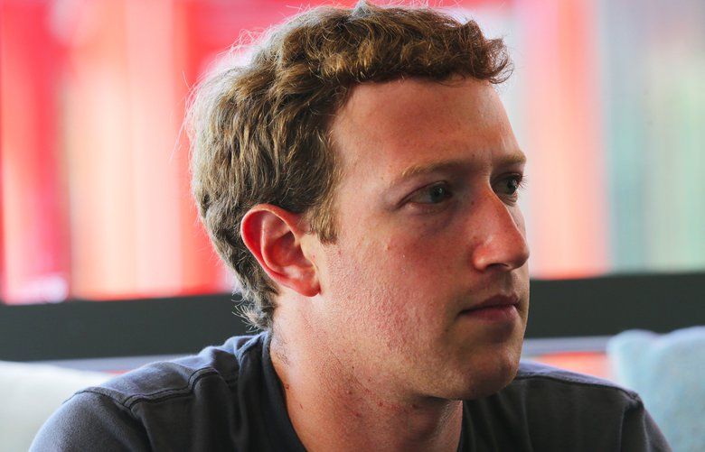**EMBARGO: No electronic distribution, Web posting or street sales before Tuesday 11:00 p.m. ET Aug. 20, 2013. No exceptions for any reasons. EMBARGO set by source.** Mark Zuckerberg, the chief executive of Facebook, at his office in Menlo Park, Calif., Aug. 15, 2013. The social media giant is set to unveil on Wednesday a coalition of tech companies working to improve data transmission in the developing world. (Jim Wilson/The New York Times)