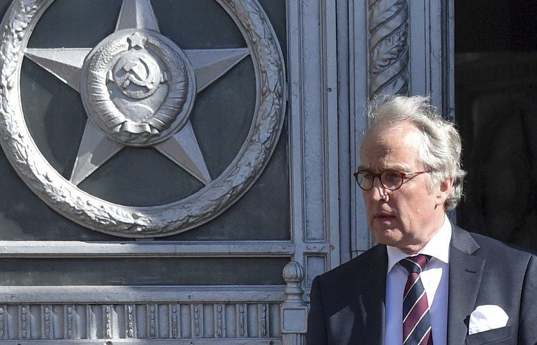 German Ambassador to Russia Rudiger Von Fritsch leaves the Russian foreign ministry building in Moscow, Russia, Friday, March 30, 2018. The Russian Foreign Ministry says it is summoning ambassadors from the countries that expelled Russian diplomats over the poisoning of an ex-spy in Britain, to serve them notices about Moscow’s response. (AP Photo/Pavel Golovkin) XAZ126 XAZ126