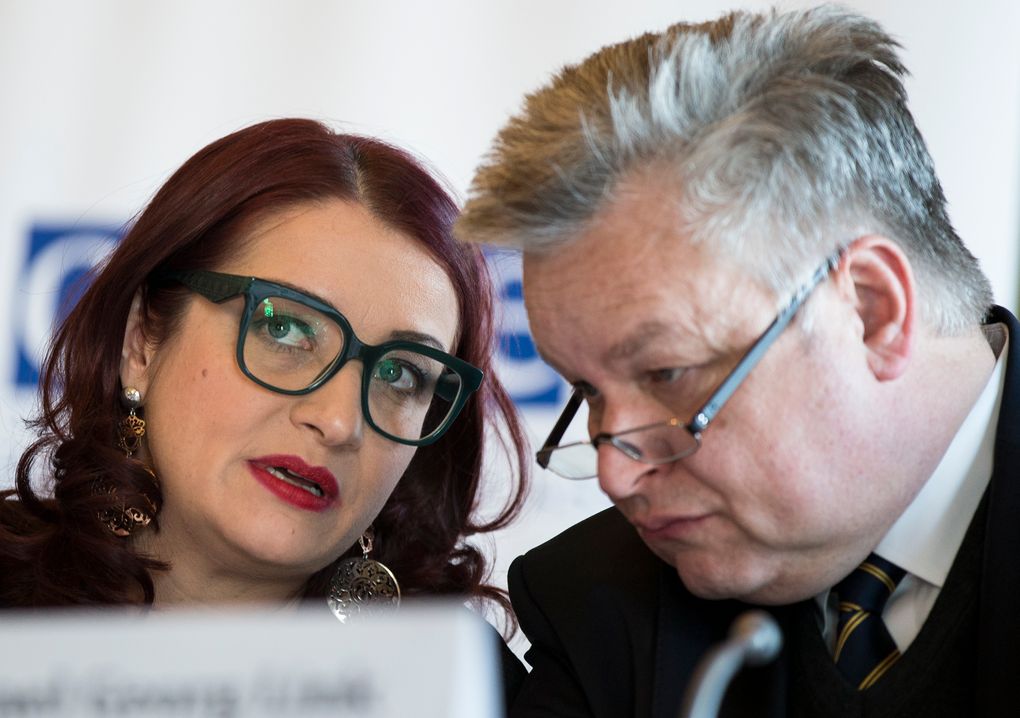 Marietta Tidei, left, speaks to Michael Georg Link in 2018. Link, the head of an international delegation monitoring the U.S. election, says his team has no evidence to support President Donald Trump’s claims about alleged fraud involving mail-in absentee ballots. (AP Photo/Alexander Zemlianichenko)