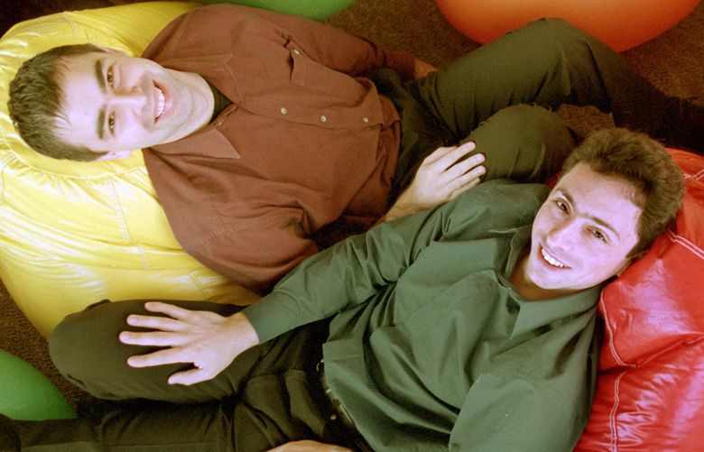 Google’s co-founders, CEO Larry Page, left, and Chairman Sergey Brin, rest on bean bags at Google’s headquarters on Friday, Nov. 11, 2000, in Mountain View, Calif.   Google  which replaced Inktomi as Yahoo’s search engine in June  is one of the few search engines that shuns pay-for-position and pay-for-inclusion. Google executives say those formulas make it more difficult for people to find potentially valuable information, like cancer research, on the Web.     “We have taken a very strong stance that our search results represent our editorial integrity,” said Google CEO Larry Page.(AP Photo/Randi Lynn Beach)