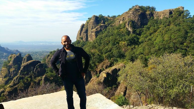 Tyrone Beason catches his breath after hiking to the top of the Tepozteco pyramid, which is perched on a cliff 2,000 feet above Tepoztlán, Mexico.
