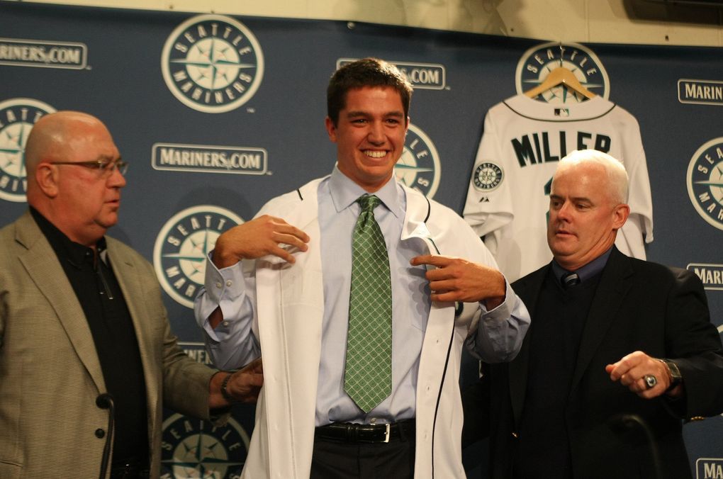 Danny Hultzen is pictured with Jack Zduriencik, left, and Tom McNamara, right, at his introductory news conference after the Mariners selected him with the second overall pick in the 2011 MLB draft. (Mark Harrison / The Seattle Times)