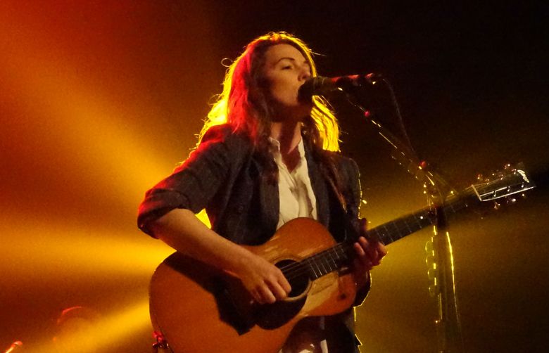 Brandi Carlile performing at the Moore Theatre on March 30, 2018. (Michael Rietmulder / Seattle Times)