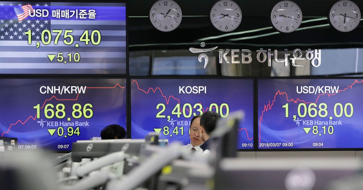 Asian stocks decline as investors watch US tariff moves | The Seattle Times