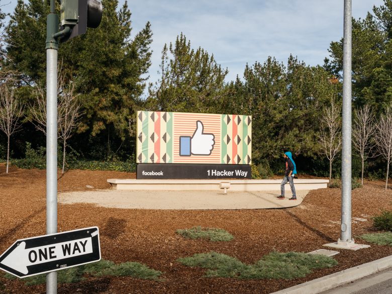 A billboard with the Facebook like icon outside the entrance to company offices in Menlo Park, California. (JASON HENRY/NYT)