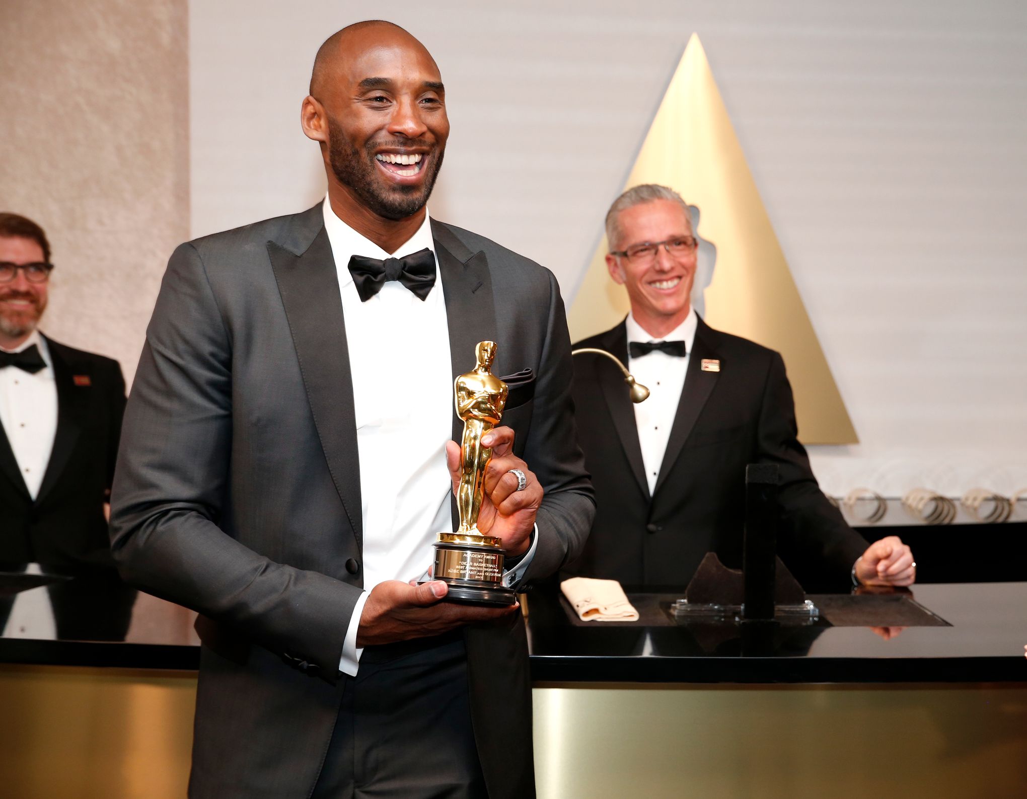 Kobe Bryant with all his trophies