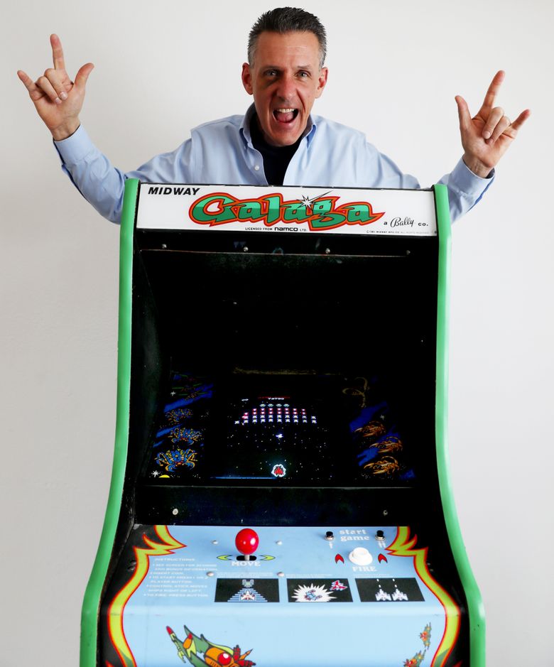 It takes hours to top 4,000,000 points in the classic video game Galaga, but Andrew Laidlaw has routinely sits on a bar stool and tops the mark. He’s the current world-record holder in the game. (Ken Lambert/The Seattle Times)