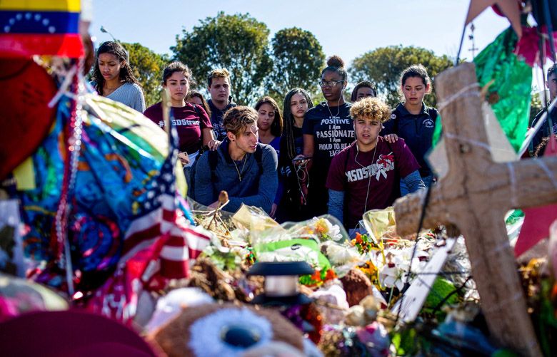 Students from West Glades Middle School, immediately next to the Marjory Stoneman Dougles High School, walk out to protest gun violence, in Parkland, Fla., March 14, 2018. The demonstrations unfolding nationwide are intended to pressure Congress to approve gun control legislation. (Saul Martinez/The New York Times)