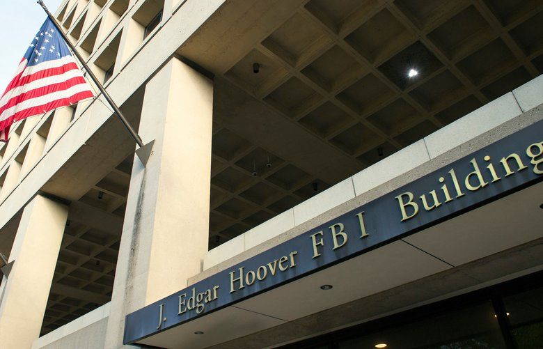FILE – In this Nov. 2, 2016, file photo, the FBI’s J. Edgar Hoover headquarter building in Washington. An FBI terrorism investigation that concluded last week with a 20-year prison sentence is atypical since it involves a defendant in the United States receiving funds from abroad to commit an attack locally.  (AP Photo/Cliff Owen, File) WX101 WX101