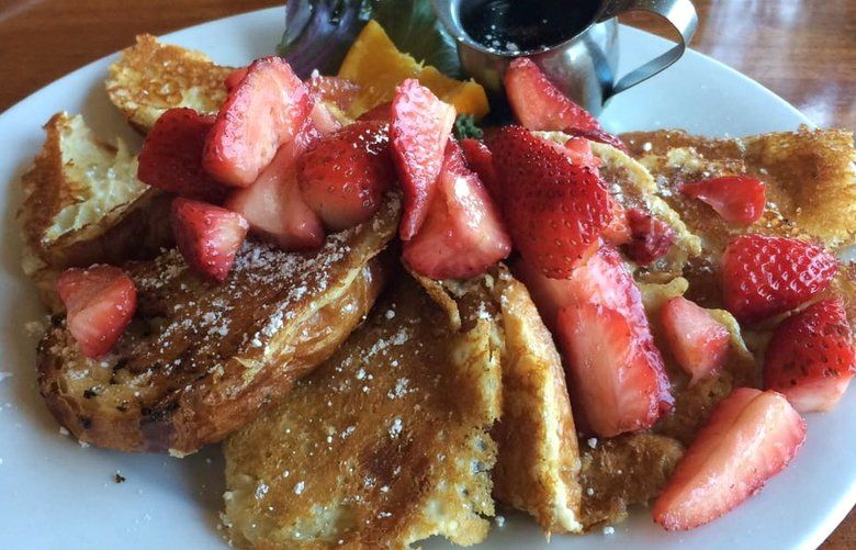 Croissant French Toast topped with fresh strawberries at Mckay’s Cottage in Bend, Ore.
