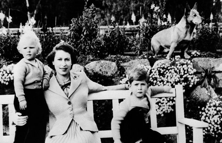 (FILES) In an undated file picture Britain’s Queen Elizabeth II poses with her two children Prince Charlse (R) and Princess Anne (L) and a corgi in Balmoral. Britain’s Queen Elizabeth II will start five months of diamond jubilee celebrations this weekend marking 60 years to the day on February 6, 2012 since she ascended to the throne after the death of her father. AFP PHOTO / – (Photo credit should read -/AFP/Getty Images)   Previous UID: 0420088442